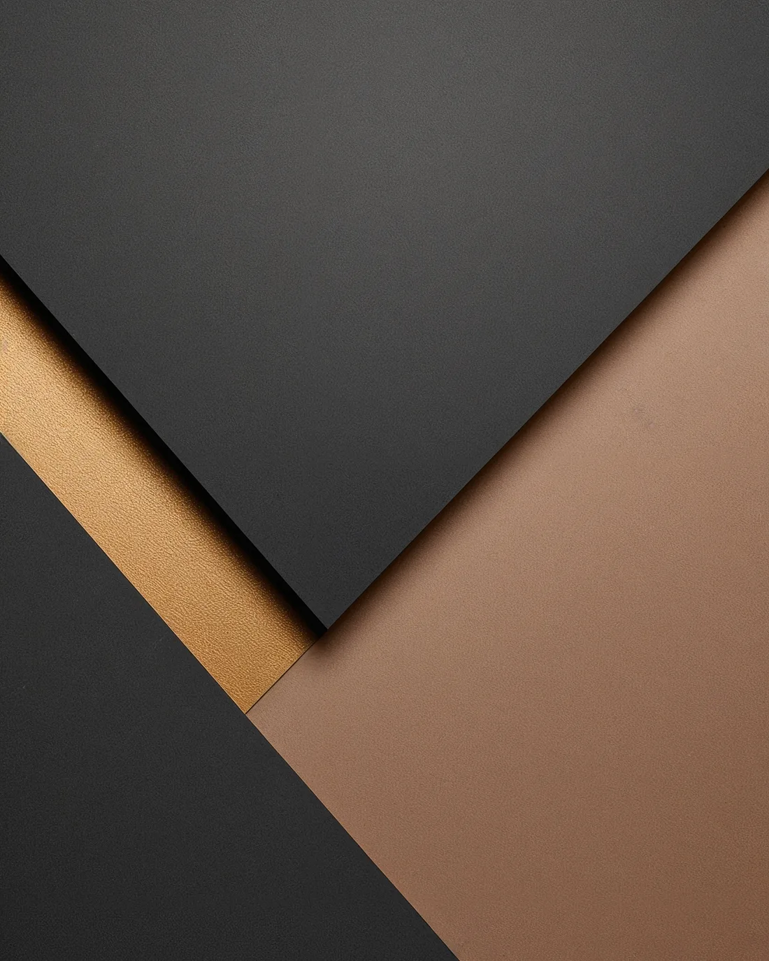 Layered black paper planes revealing a single gold seam